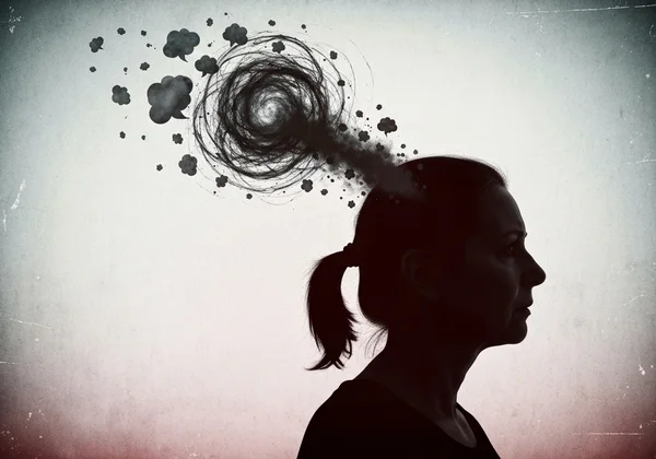 Person with swirling intrusive thoughts, anxiety cycle